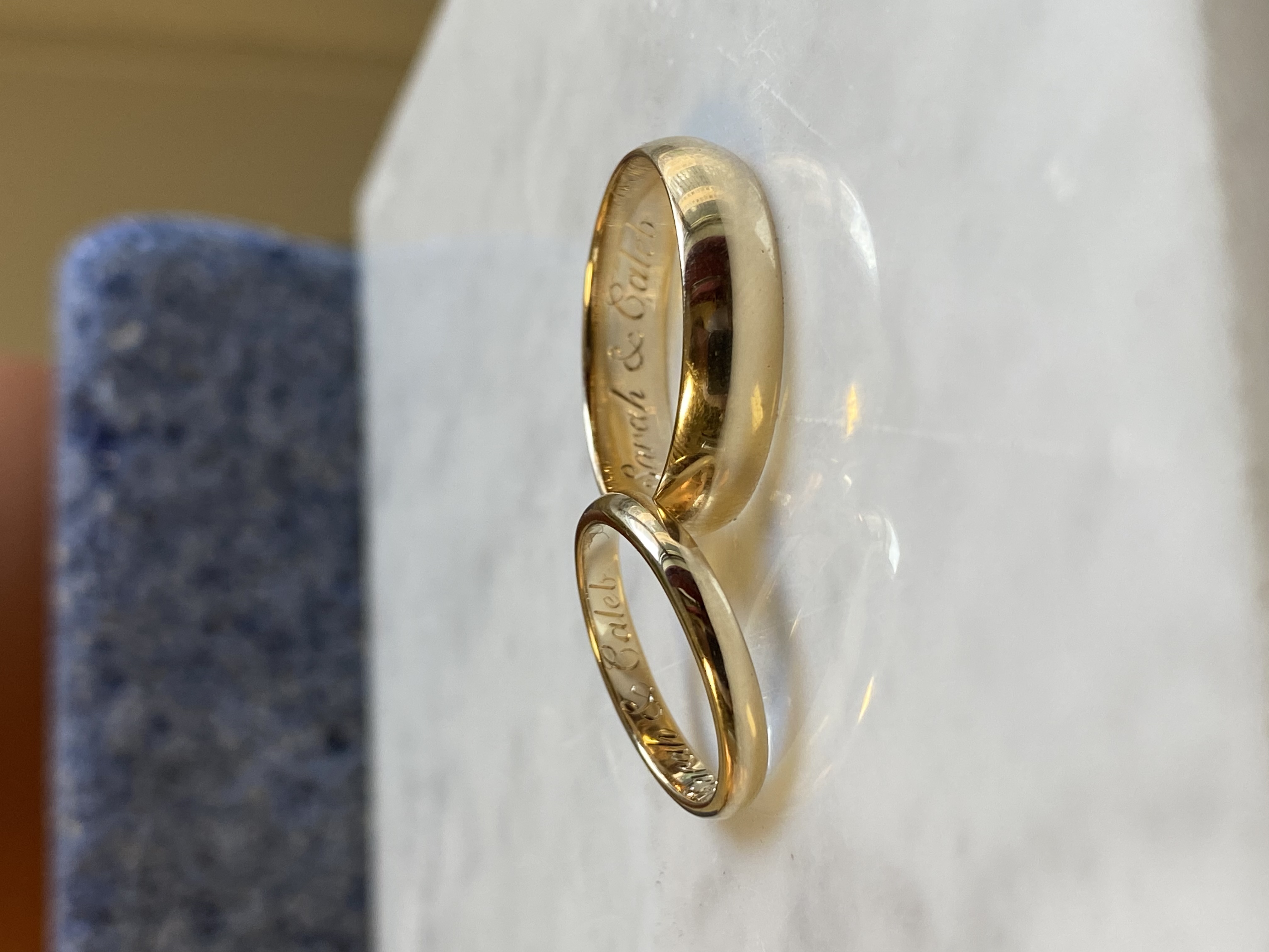 His and hers gold wedding bands with inside hand-engraved inscription — Bear Goldsmithing Toronto