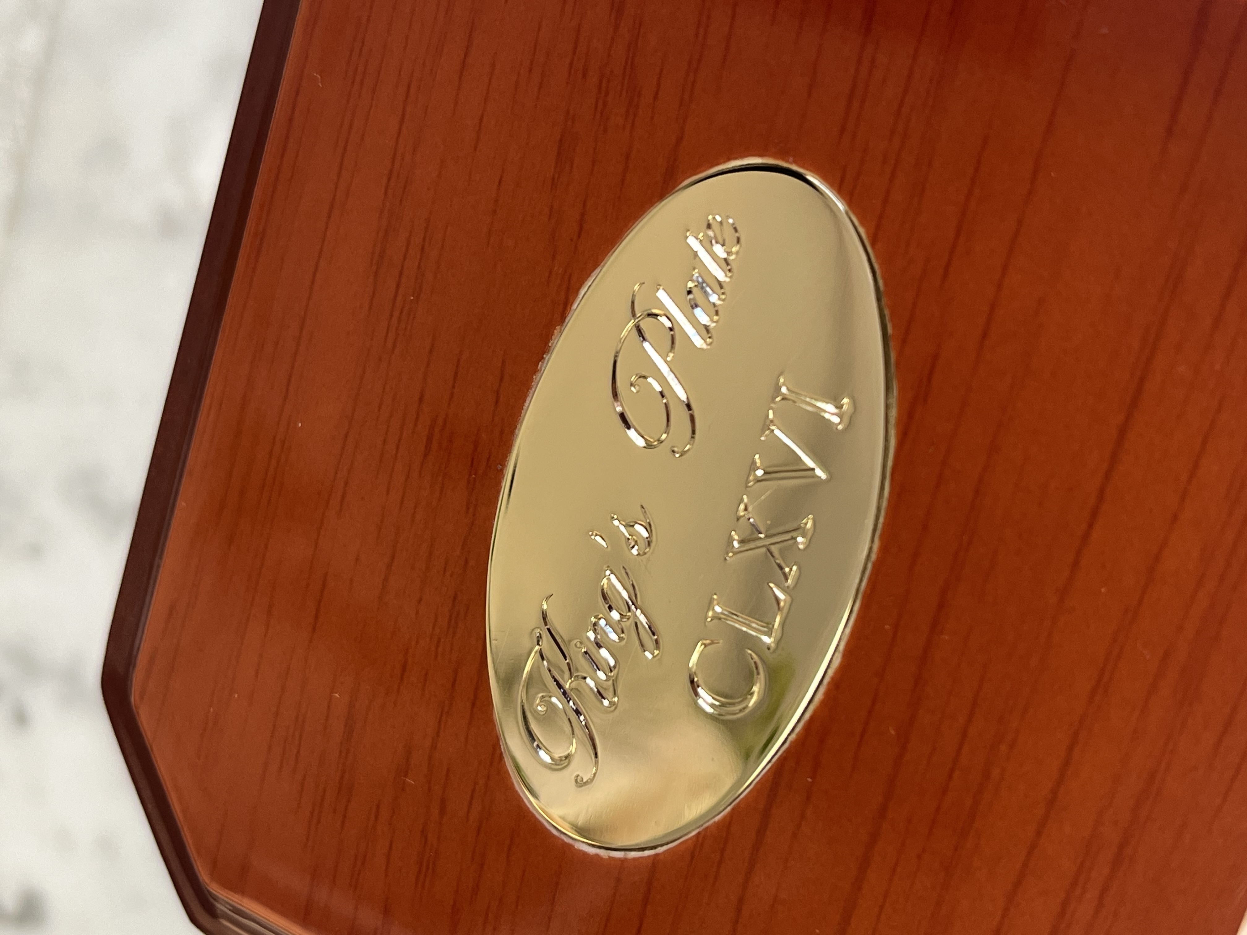Hand-engraved King's Plate CLXVI gold plate on jewellery box
