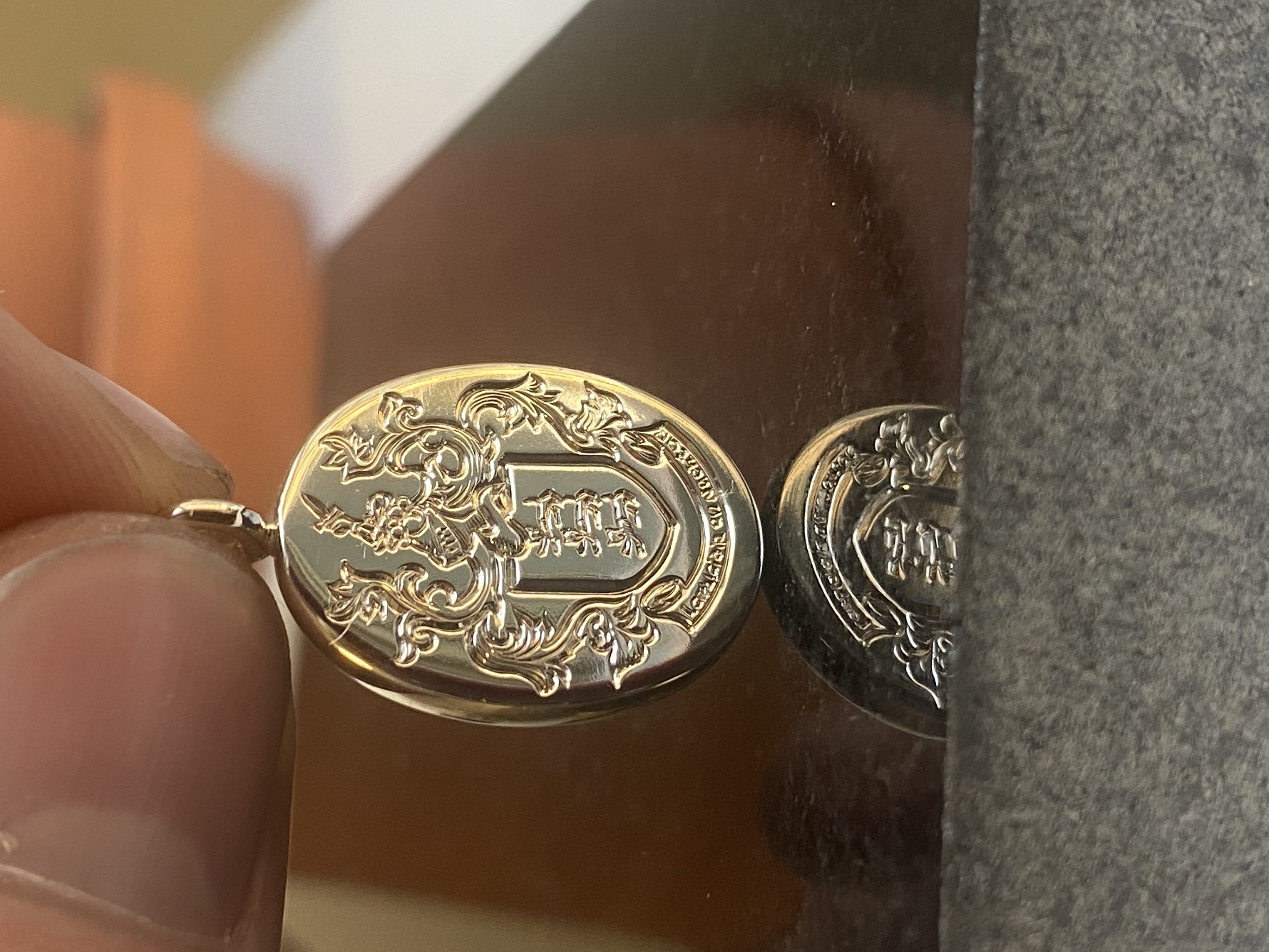 Complete heraldic family crest engraved silver pendant — crest engraving Toronto