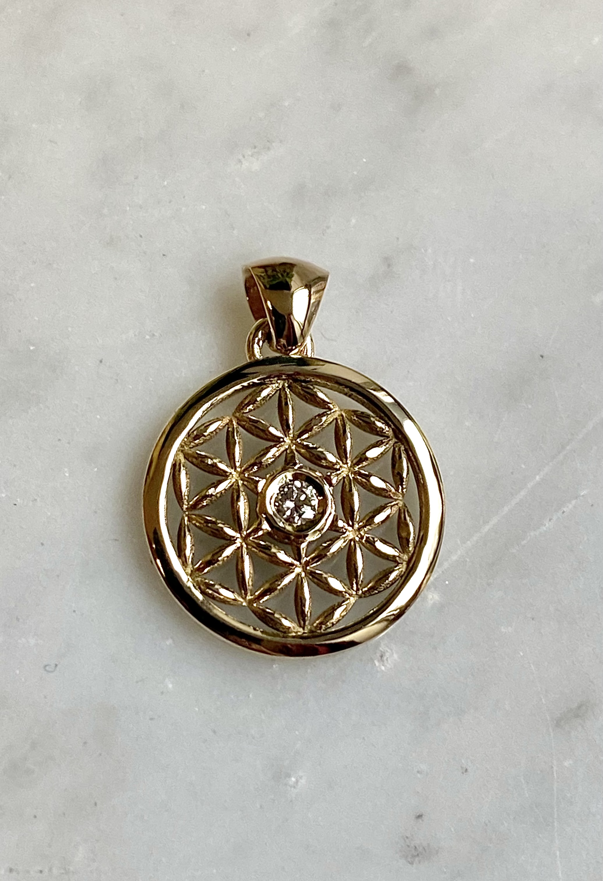 Flower of life pendant in yellow gold with diamond centre — custom pendant Toronto