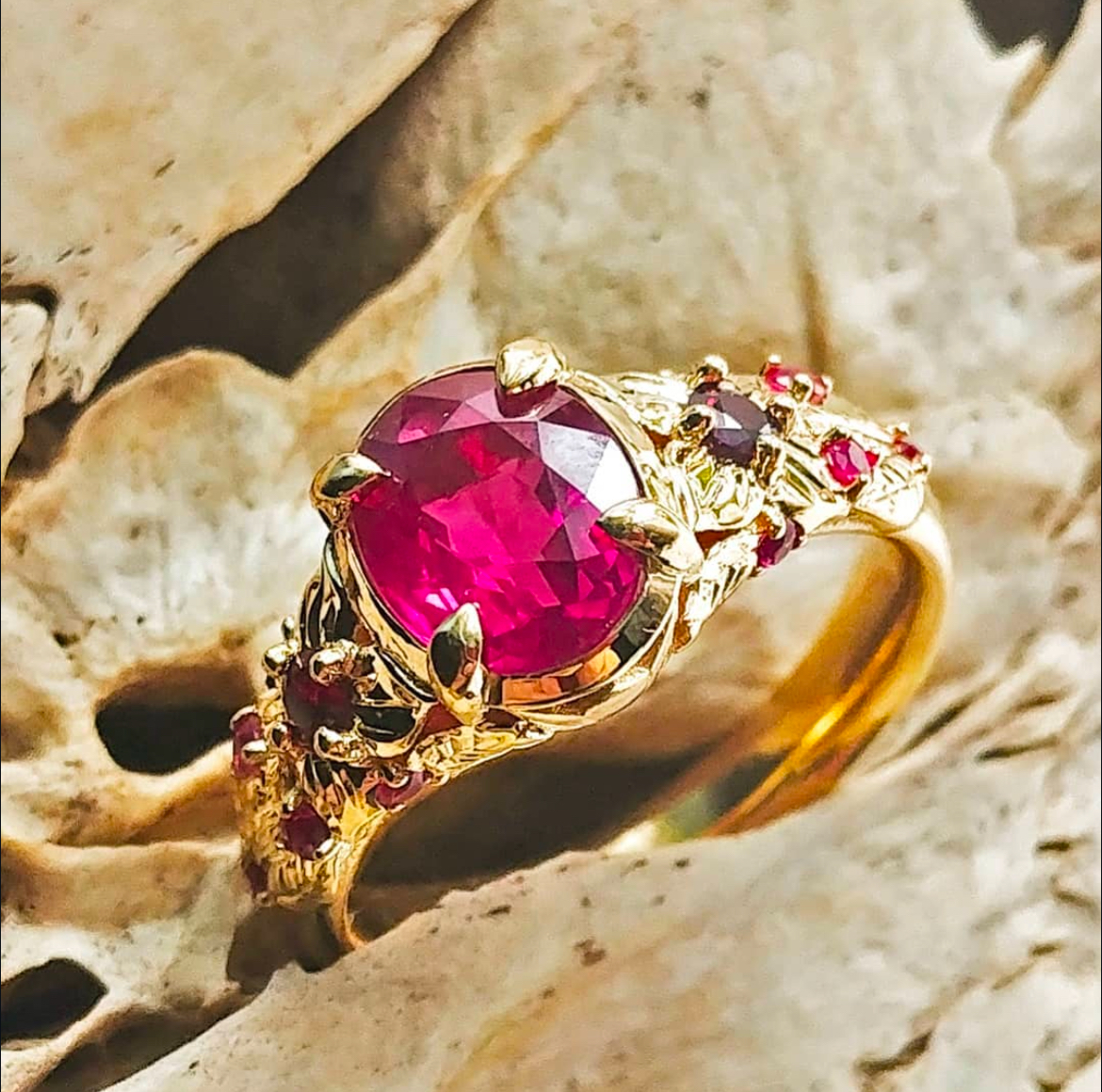 Burmese ruby lotus floral engagement ring with garnet and accent rubies — Bear Goldsmithing Toronto