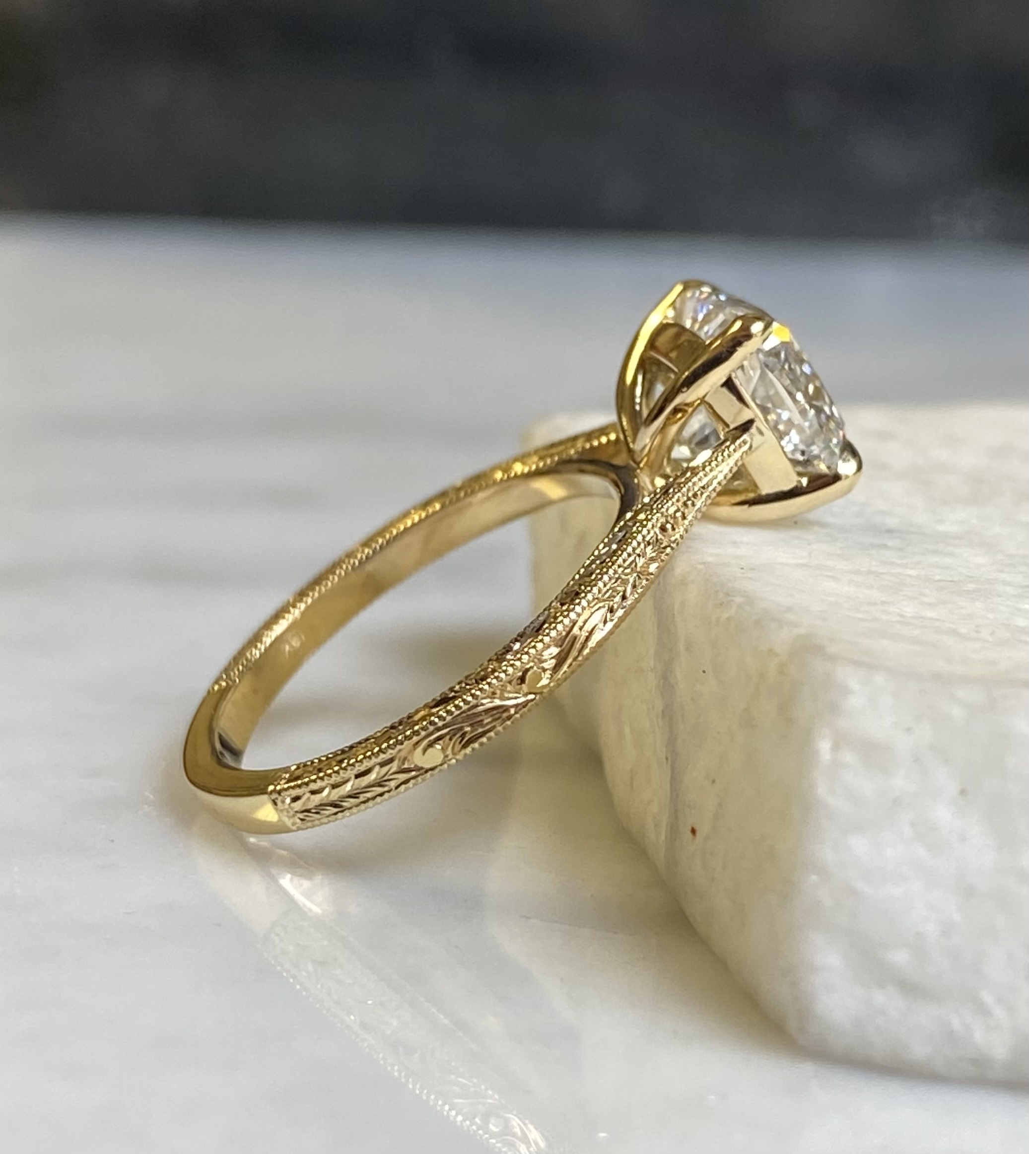 Cushion diamond solitaire 3/4 rear angle showing engraved band and basket setting — Bear Goldsmithing Toronto