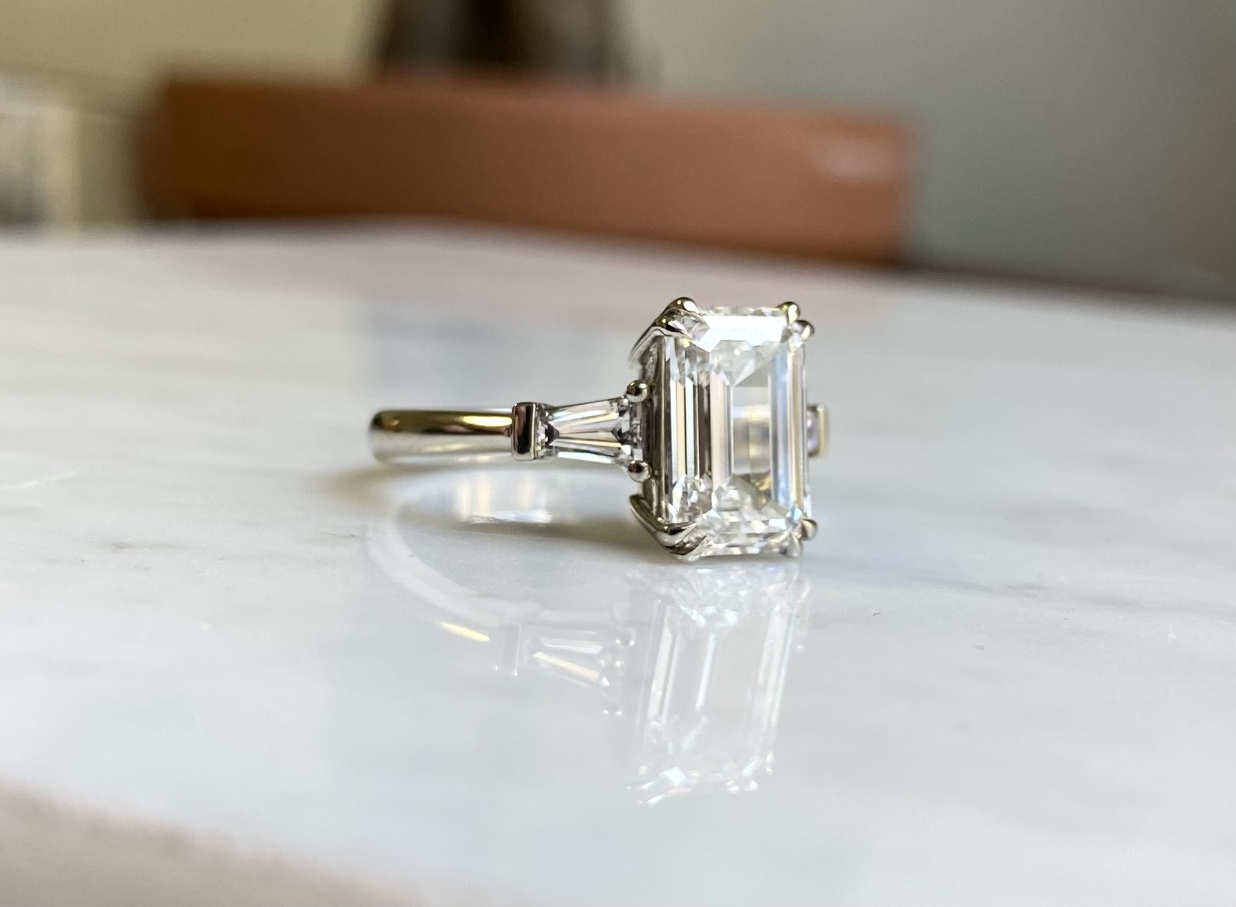 Side profile of emerald cut and baguette diamond ring — Bear Goldsmithing Toronto
