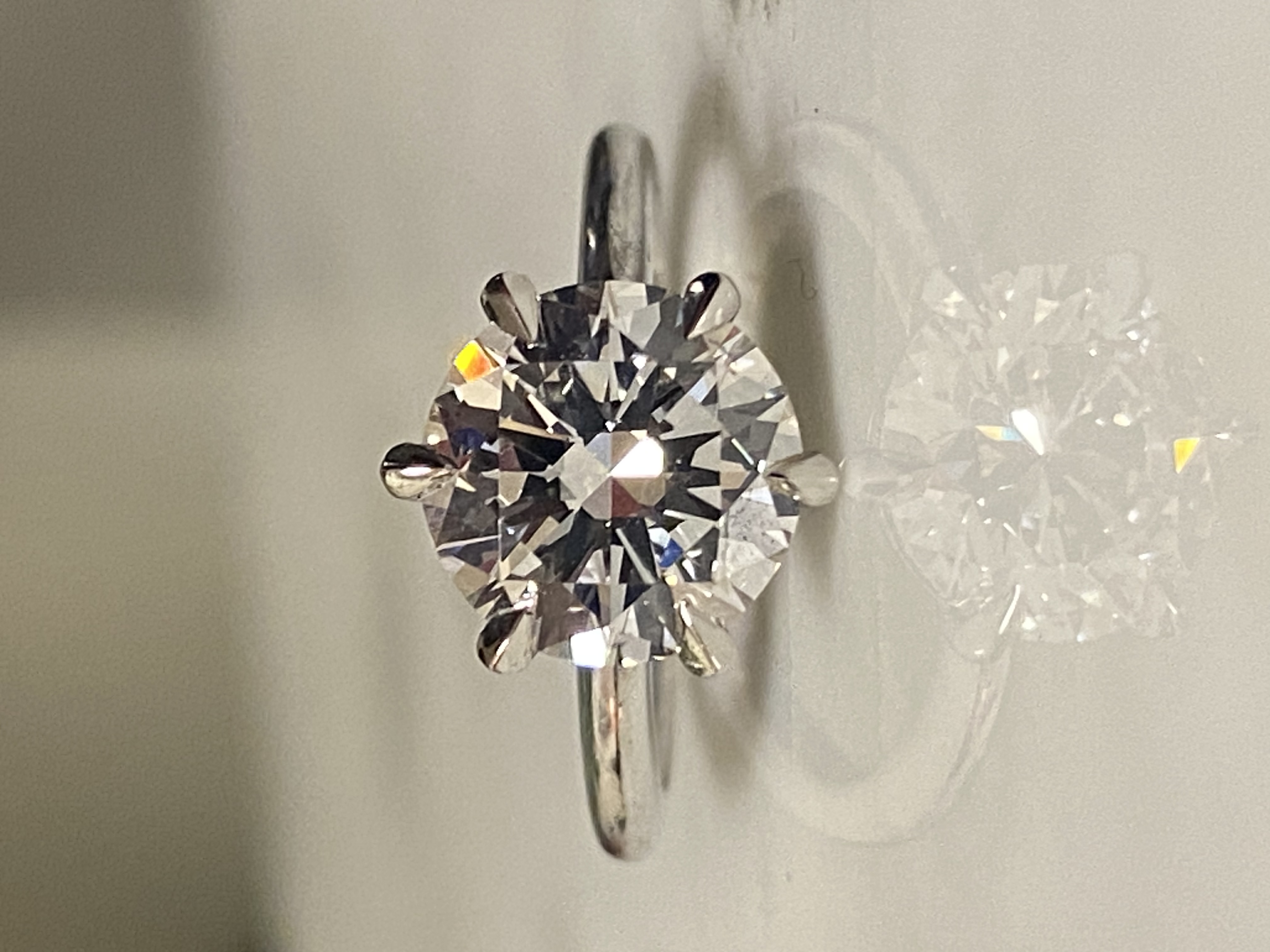 Six claw round brilliant diamond solitaire engagement ring in white gold — Bear Goldsmithing Toronto