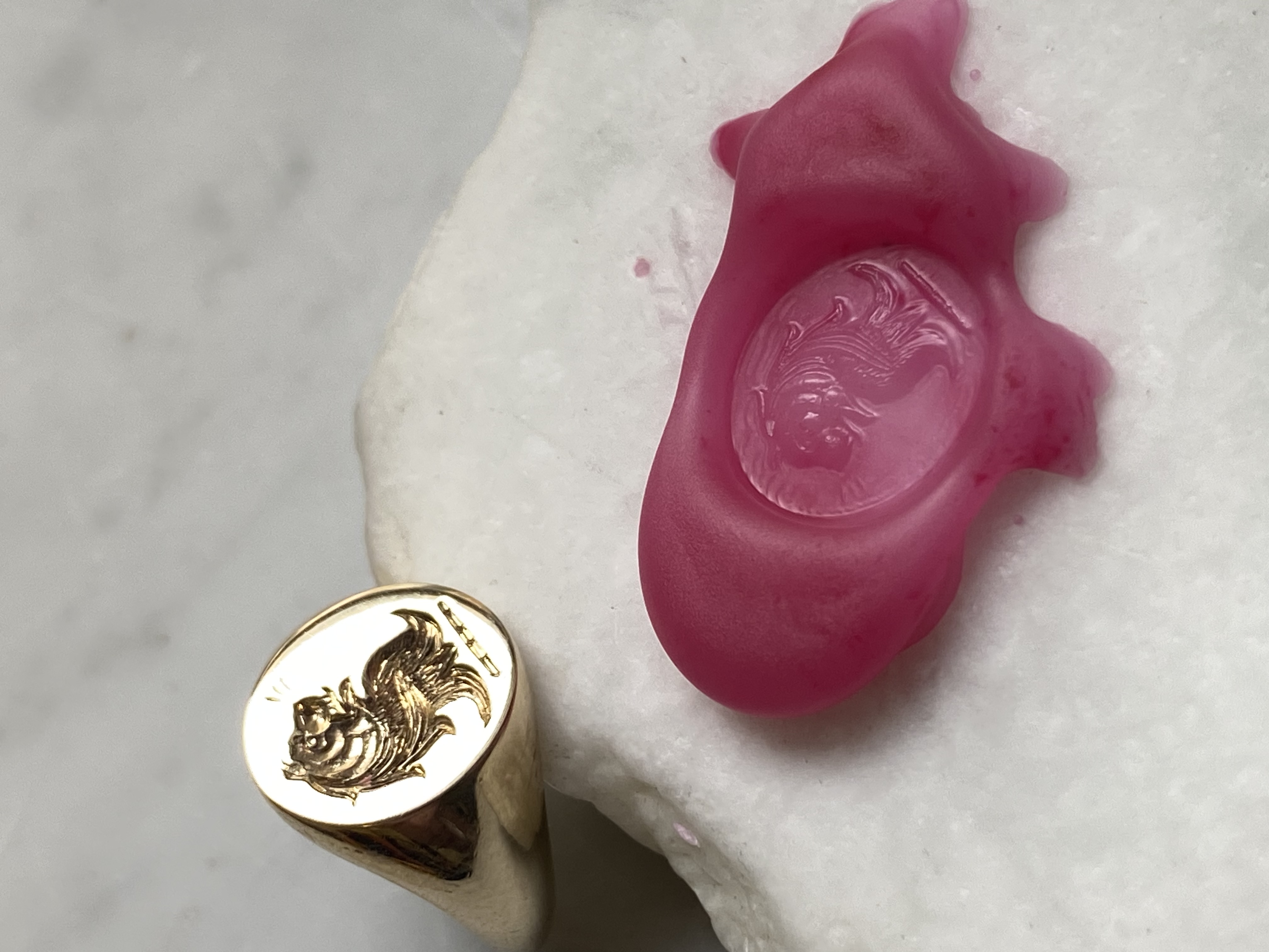 Lion intaglio signet ring with wax seal impression — hand-engraved by Alex Bär, Bear Goldsmithing Toronto